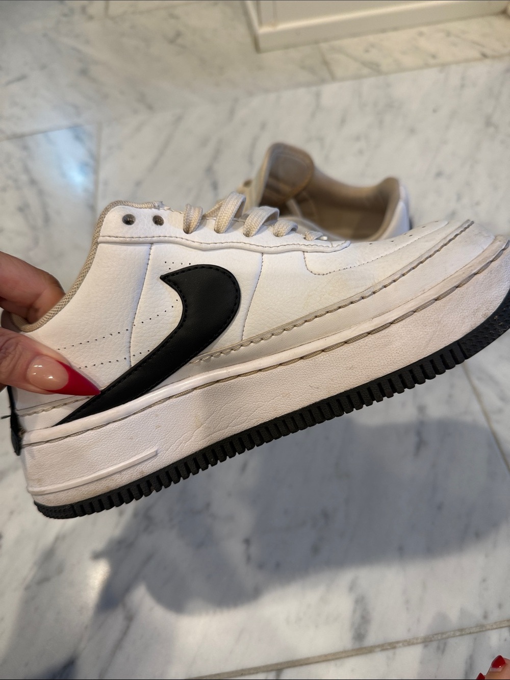 Nike Kids White Sneakers with Black Swoosh